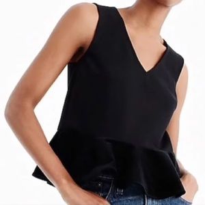J crew peplum top. Stretchy on the top and velvet on the peplum. Size medium.